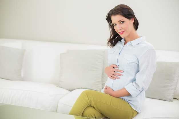 Почему болит низ живота при начале беременности?